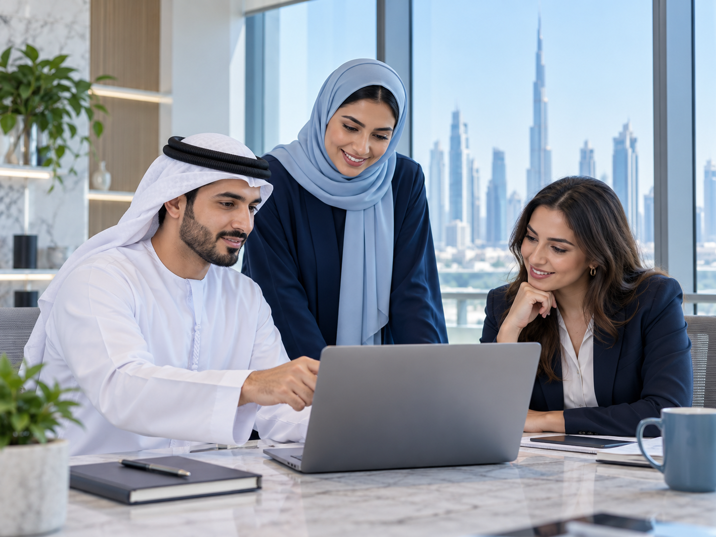 Emirati professionals collaborating in a bright UAE office